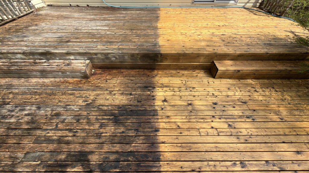 Wood deck showing darker and cleaned sections